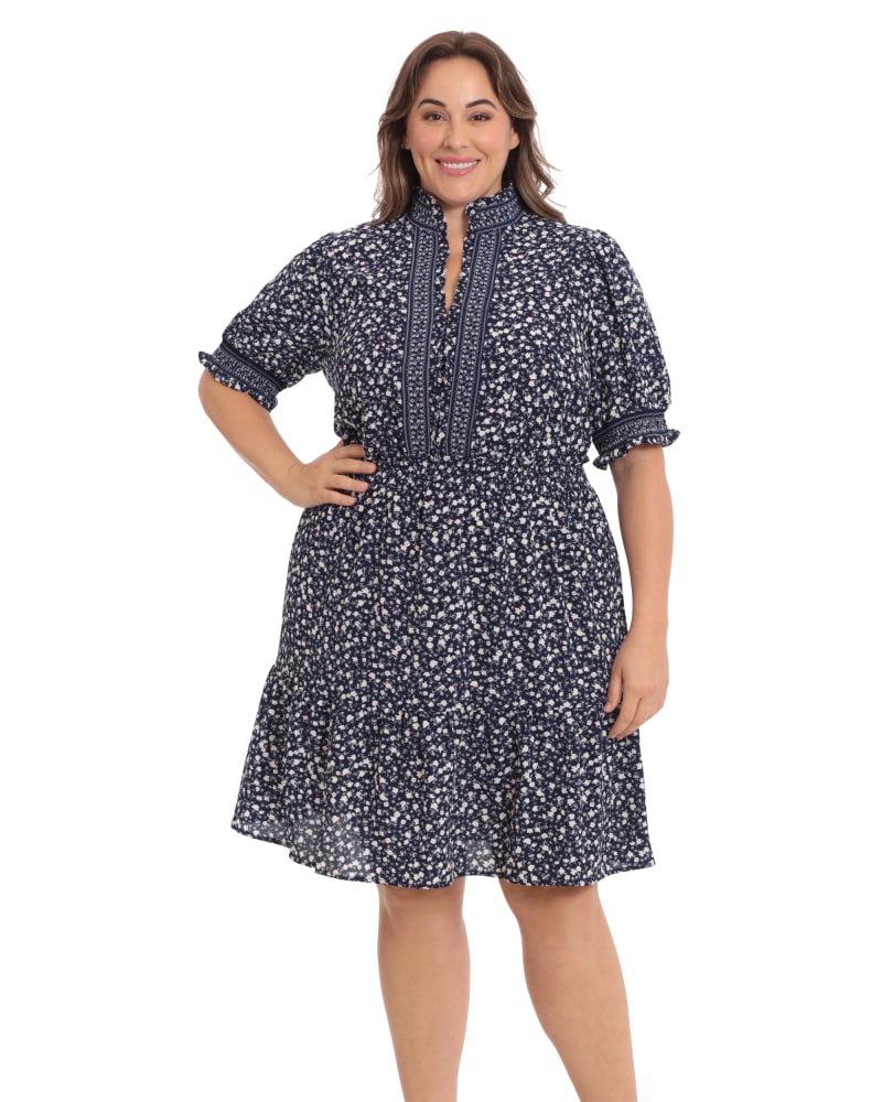 Front of a model wearing a size 16W Smocked waist and puff sleeve tiered skirt dress in Navy/White by London Times. | dia_product_style_image_id:268558